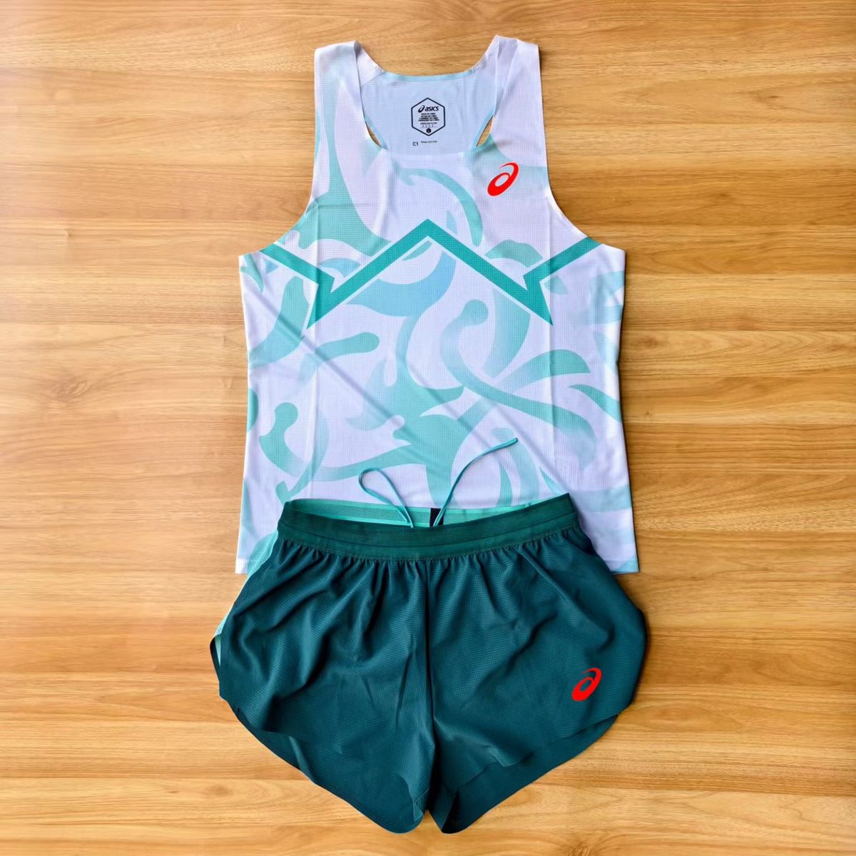 Camisteta de competicion Asics